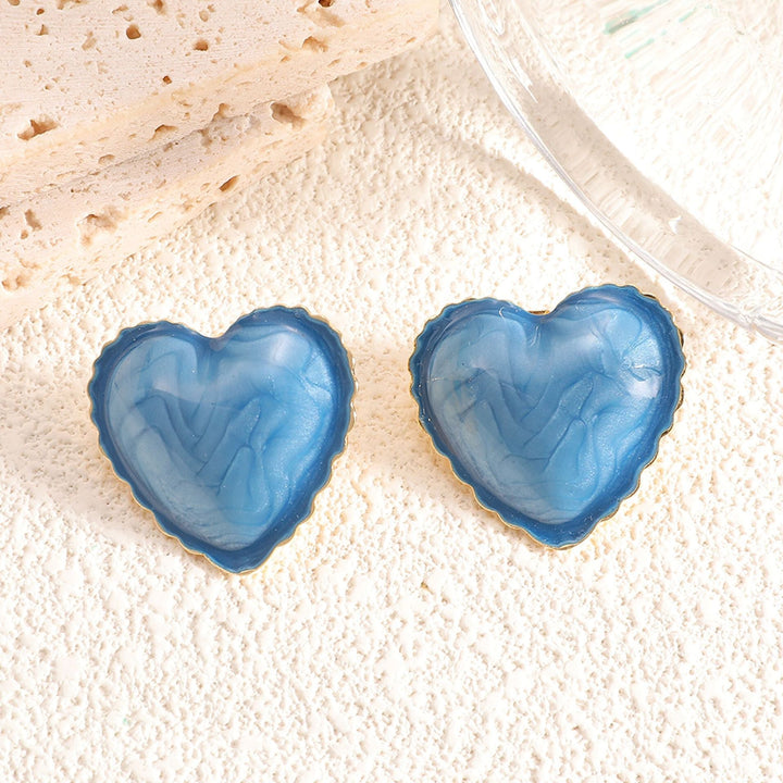 Women’s stud earrings with intricate heart design made of high-quality epoxy resin Nin Boutique