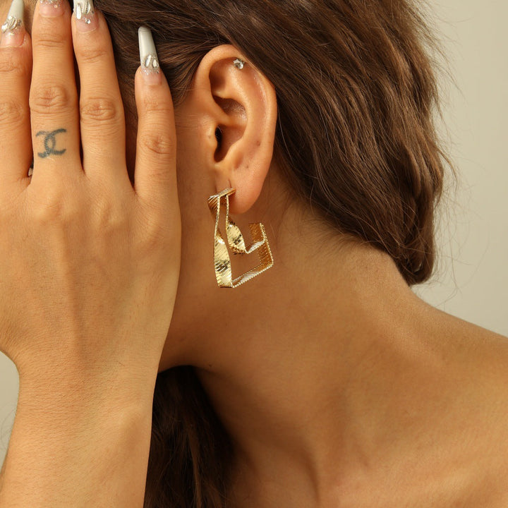 Women's earrings with innovative wave pattern Nin Boutique