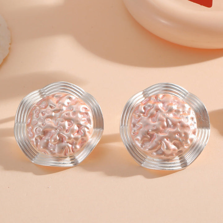 Women’s earrings in a modern, wave-shaped design Nin Boutique