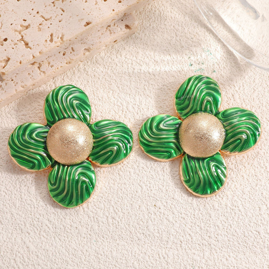 Ladies earrings in elaborate flower pattern Nin Boutique