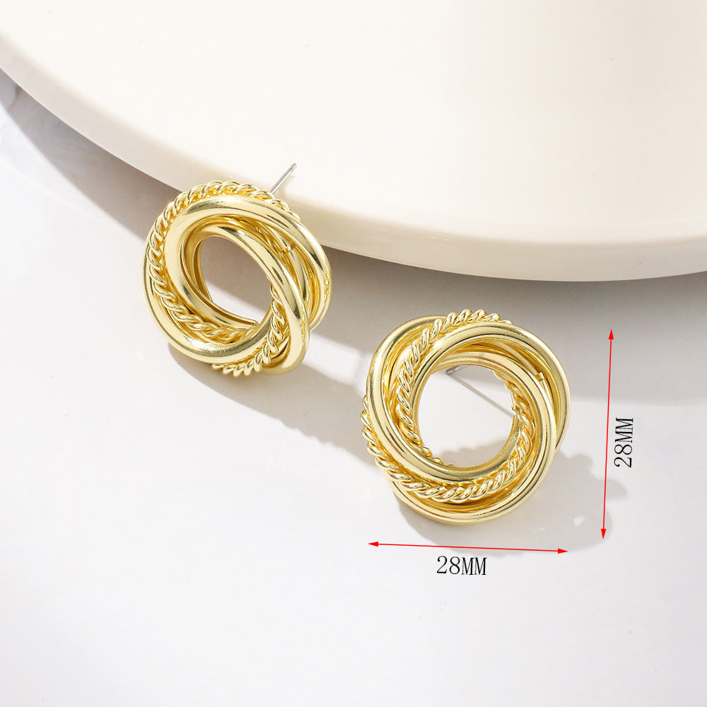 Women’s earrings with intricate braided design Nin Boutique