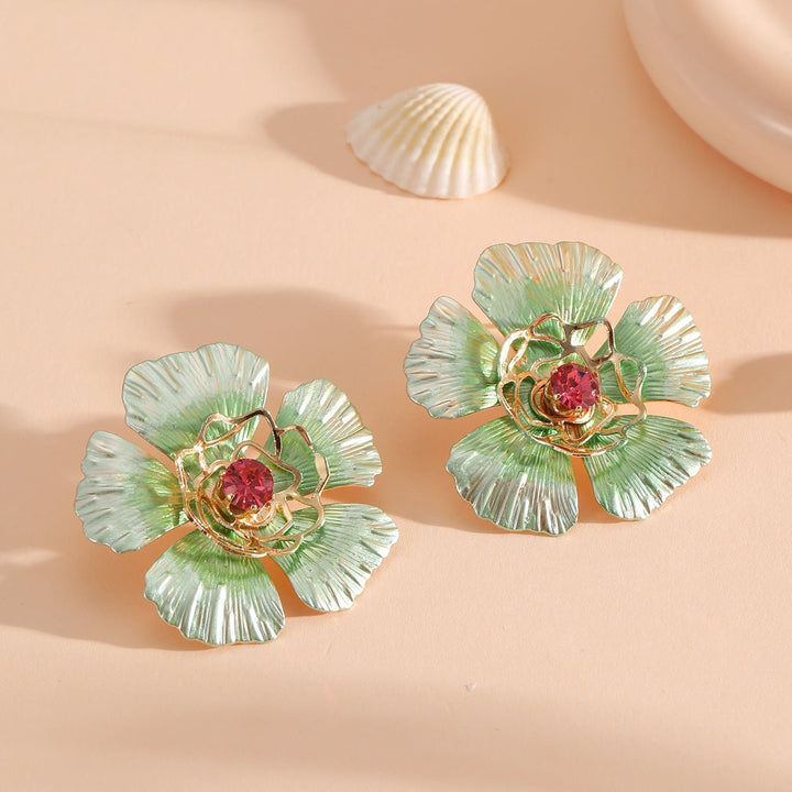 Ladies stud earrings in an artistic flower design Nin Boutique
