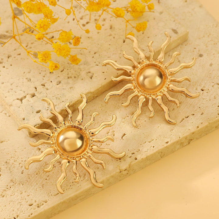 Ladies' earrings in artistic sun design Nin Boutique