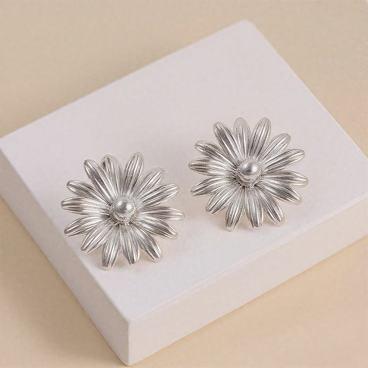 Ladies earrings in intricate flower design Nin Boutique