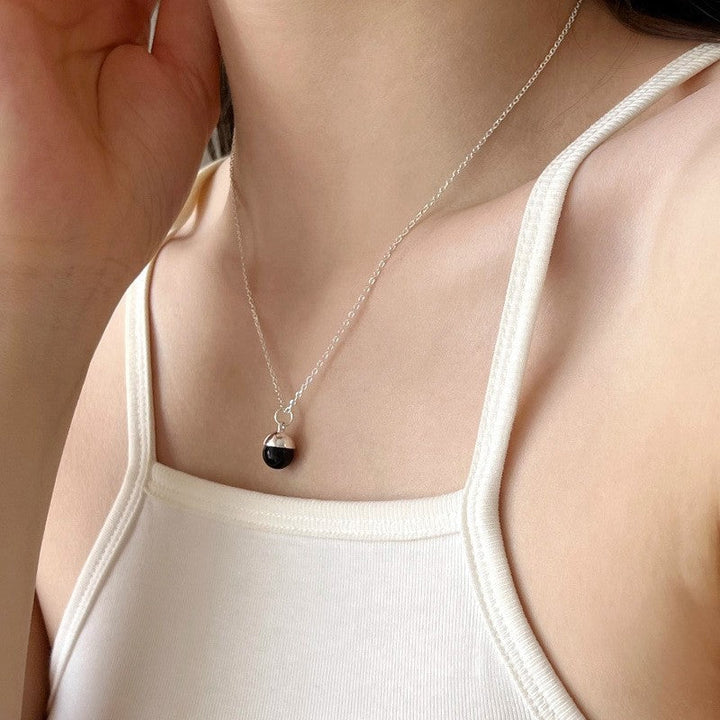 Women’s necklace with stylish half-sphere pendant made of stainless steel Nin Boutique