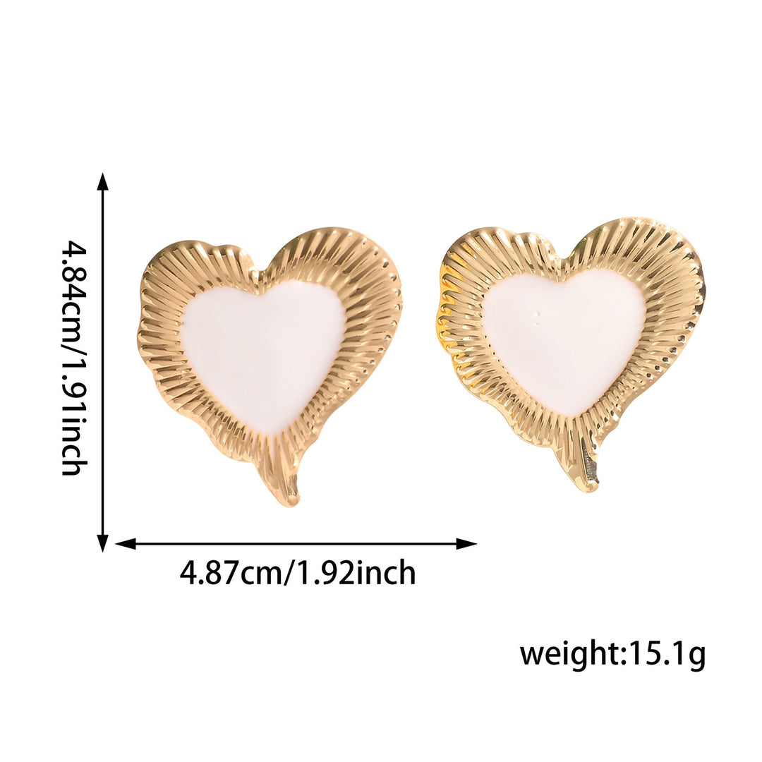 Ladies earrings in heart-shaped, glamorous design Nin Boutique