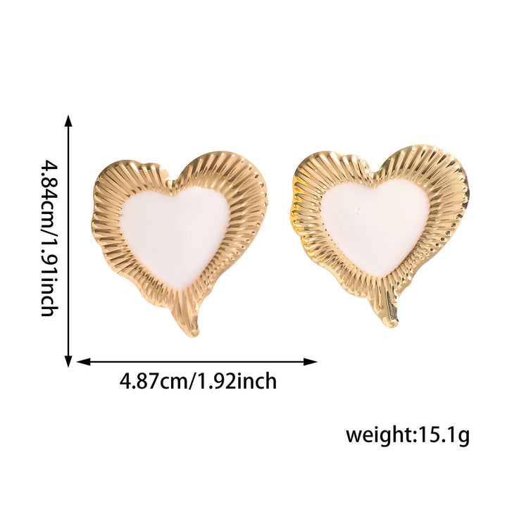 Ladies earrings in heart-shaped, glamorous design Nin Boutique