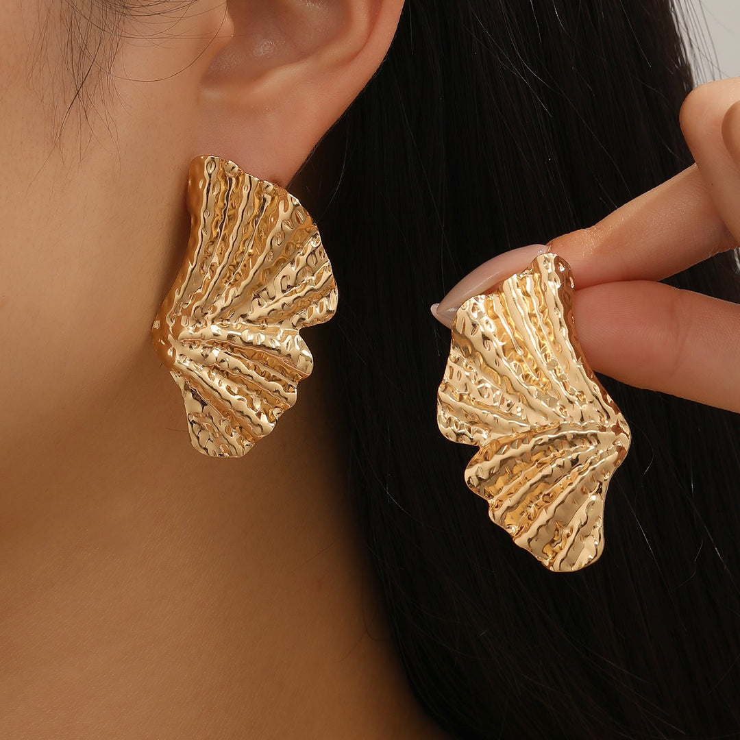 Ladies earrings with stylish shell design and antique finish Nin Boutique