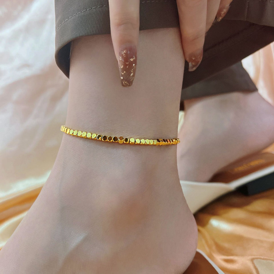 Women's filigree anklet made of shiny metal Nin Boutique