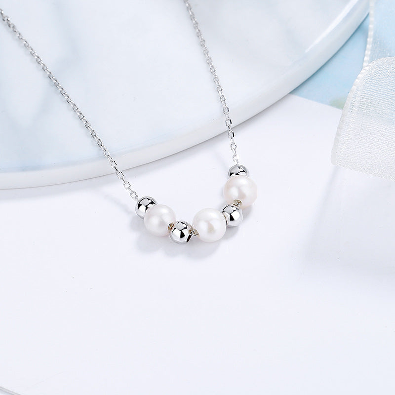 Women's necklace with radiant pearls and stylish silver accents Nin Boutique