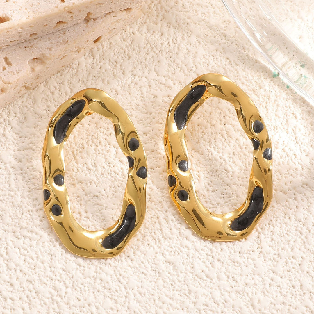 Women earrings in unique organic design Nin Boutique