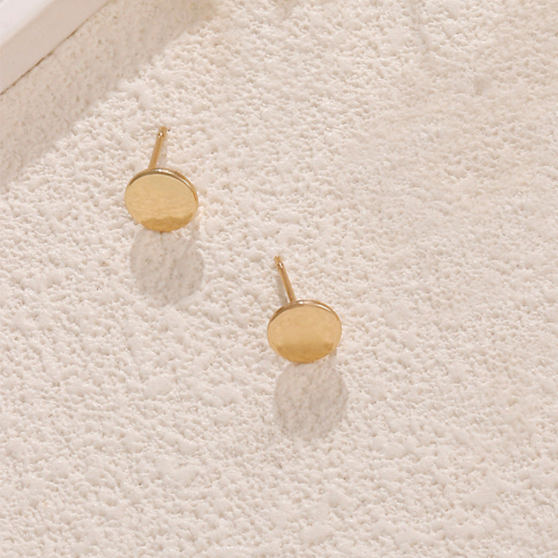 Ladies earrings in artistic face design Nin Boutique
