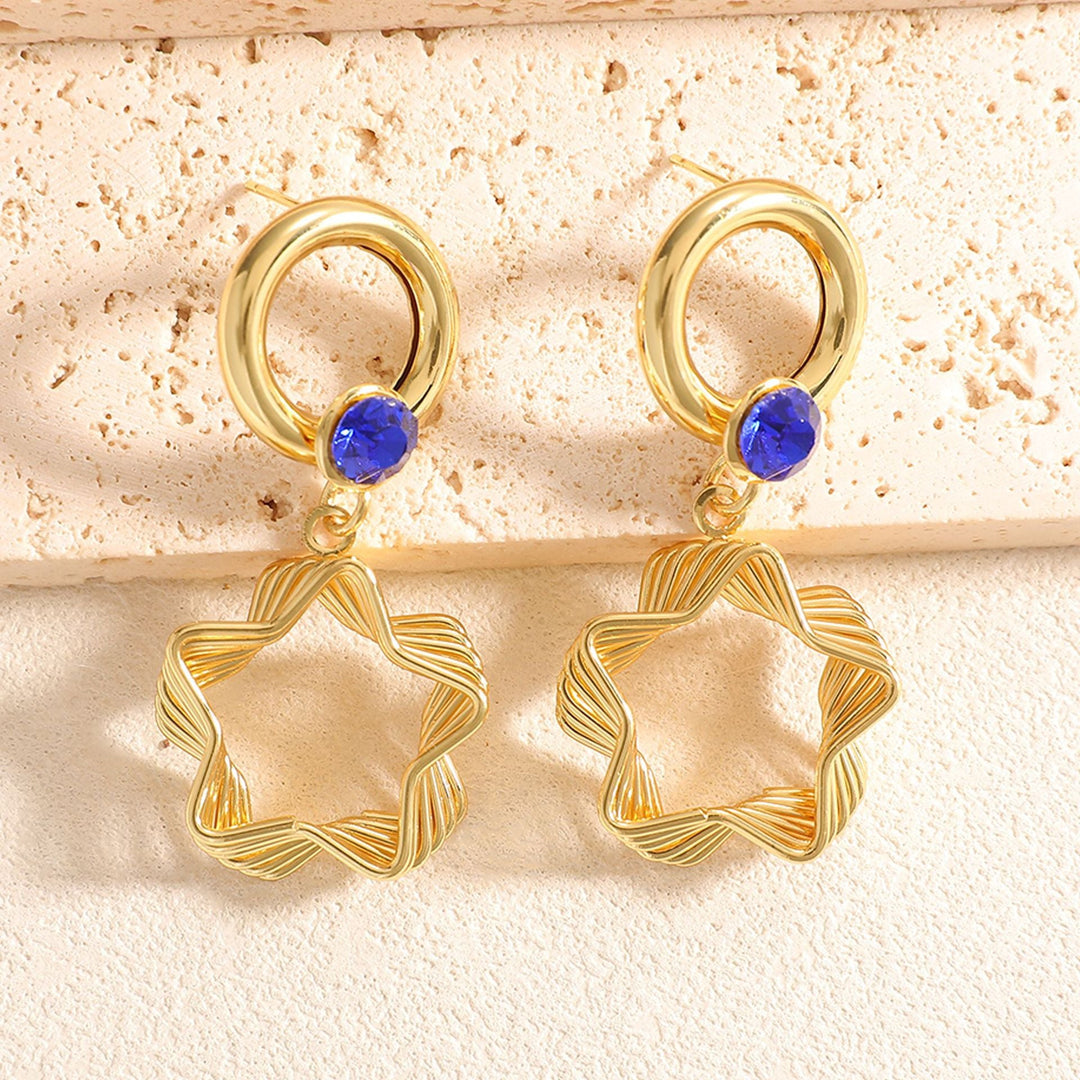 Ladies earrings with elaborate star design Nin Boutique