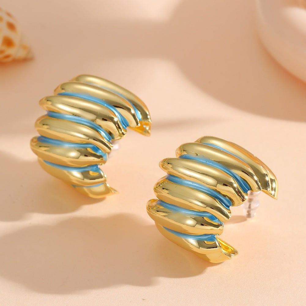 Ladies' jewelry earrings in elegant wave pattern Nin Boutique