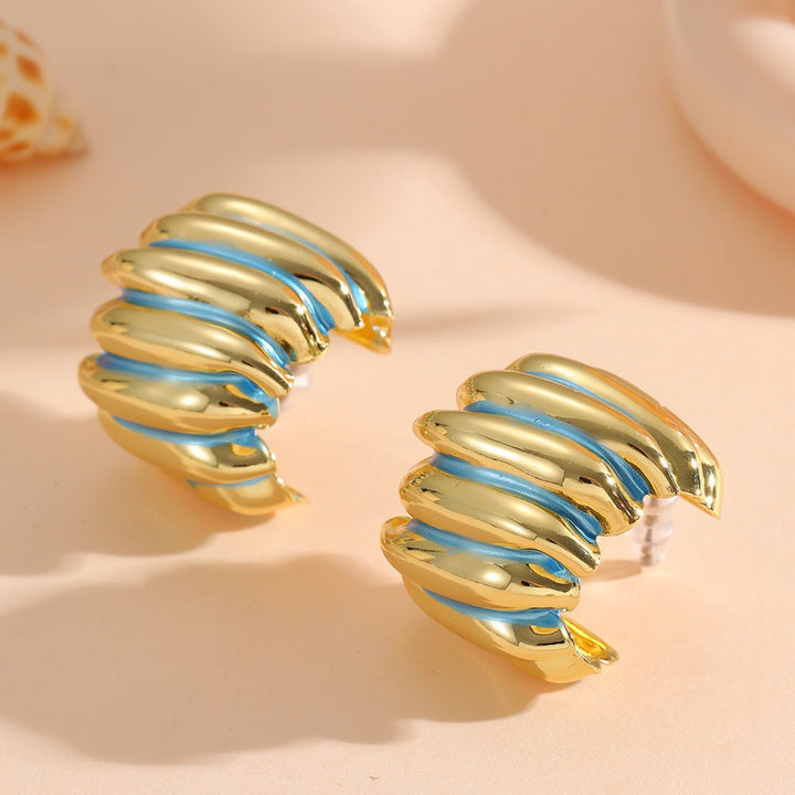 Ladies' jewelry earrings in elegant wave pattern Nin Boutique