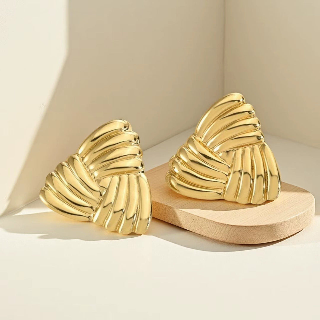 Women's earrings in sculptural wave design Nin Boutique