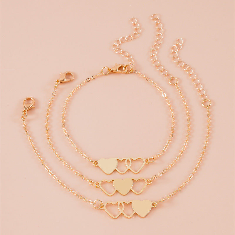 Women's anklet with playful heart motifs and delicate chain structure Nin Boutique