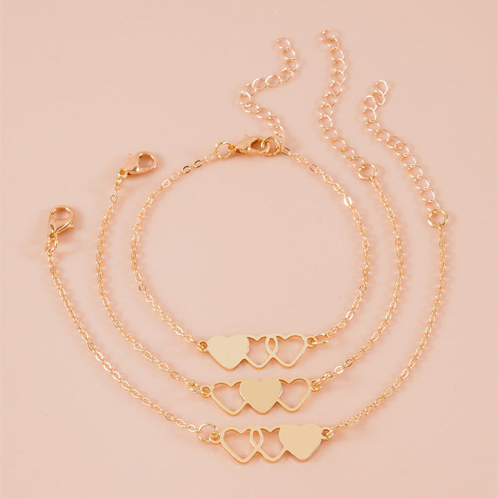 Women's anklet with playful heart motifs and delicate chain structure Nin Boutique