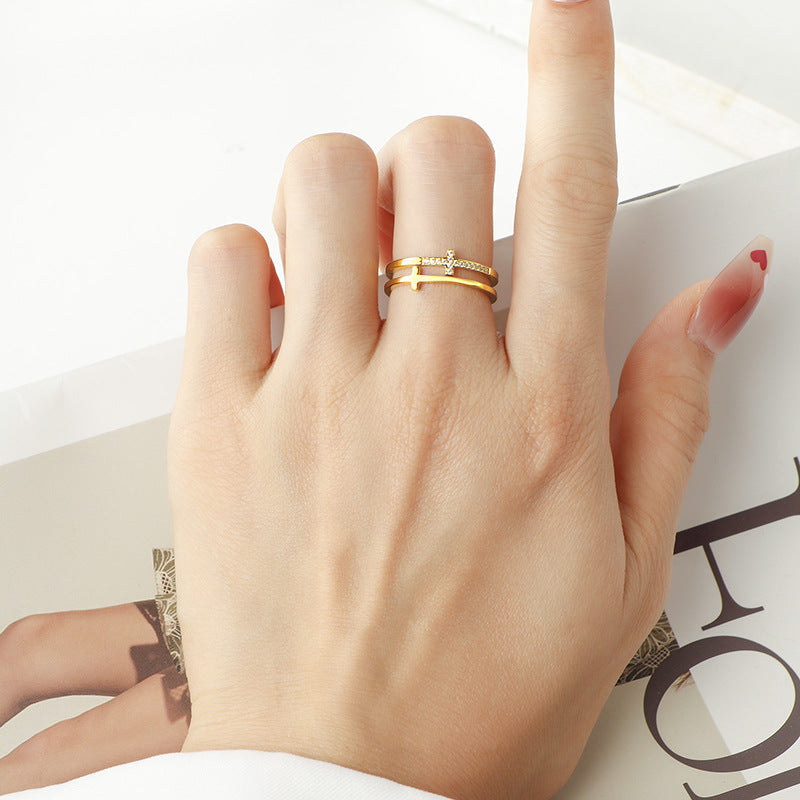 Women's ring with filigree cross design and sparkling zirconia stones Nin Boutique