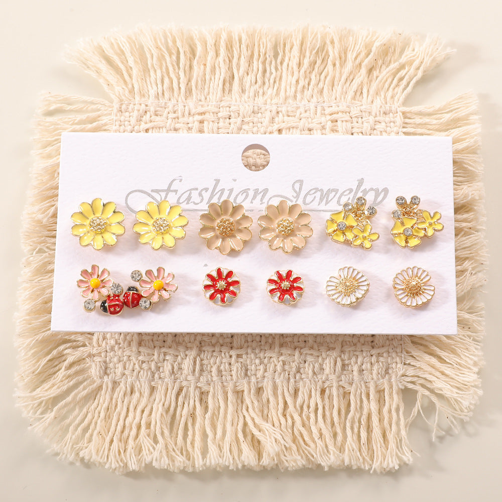 Ladies earring set with playful animal and mushroom design Nin Boutique