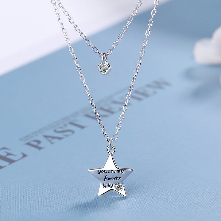 Ladies necklace with stylish star pendant and sparkling zircon Nin Boutique