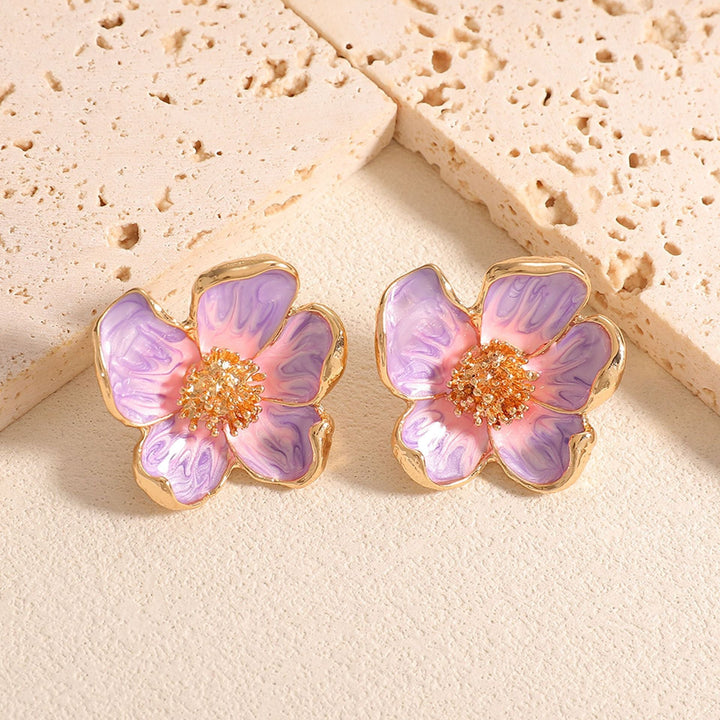 Ladies earrings in floral design with detailed accents Nin Boutique