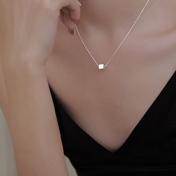 Women's necklace with modern, geometric cube pendant Nin Boutique