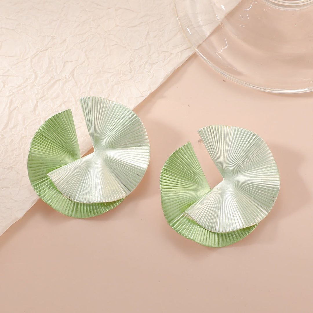 Ladies earrings with artistic fold design Nin Boutique