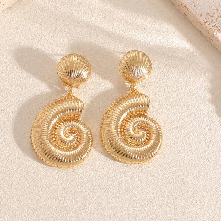 Ladies earrings in luxurious shell design Nin Boutique