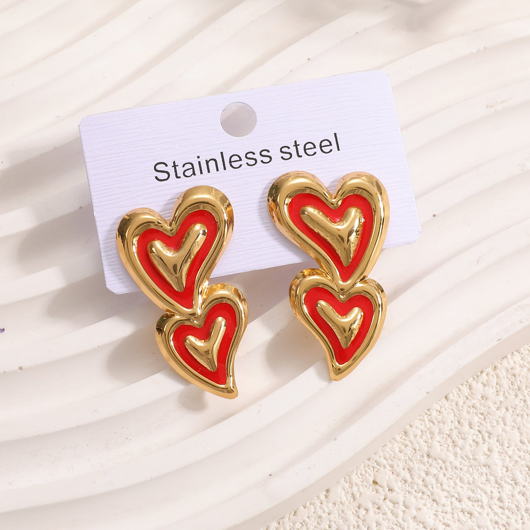 Ladies earrings in playful heart design Nin Boutique