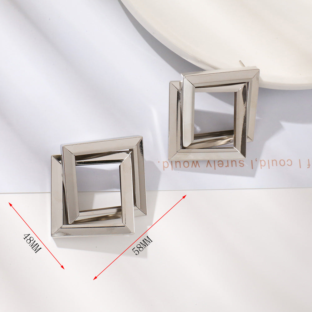 Ladies' earrings in contemporary square ring design Nin Boutique