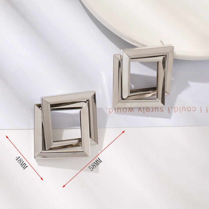 Ladies' earrings in contemporary square ring design Nin Boutique