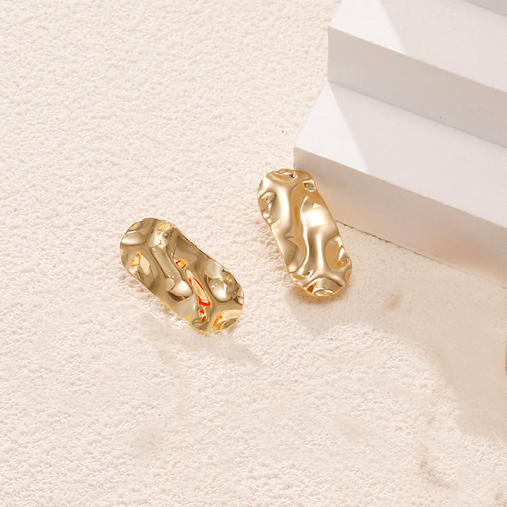 Ladies earrings in artistic face design Nin Boutique
