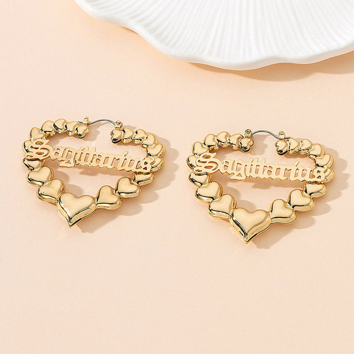 Women’s earrings with unique heart design and astrological element Nin Boutique