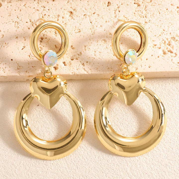 Ladies earrings with modern heart and ring design Nin Boutique