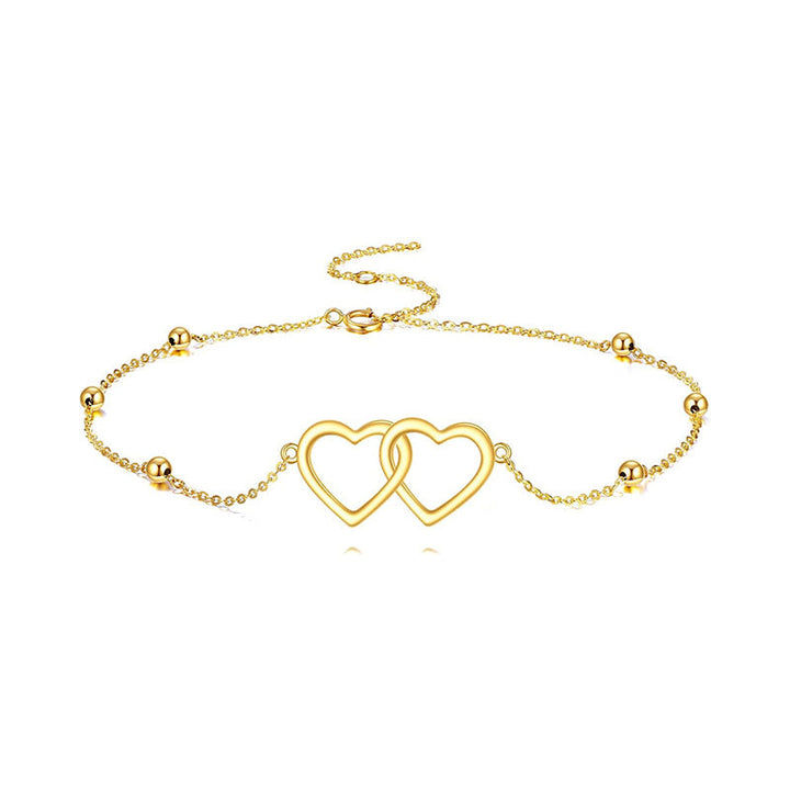 Ladies ankle bracelet with interlocking heart pendants and delicate design Nin Boutique