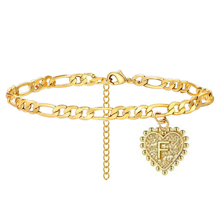Ladies ankle bracelet with heart charm and elegant chain structure Nin Boutique