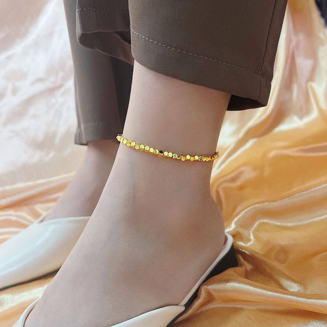 Women's filigree anklet made of shiny metal Nin Boutique