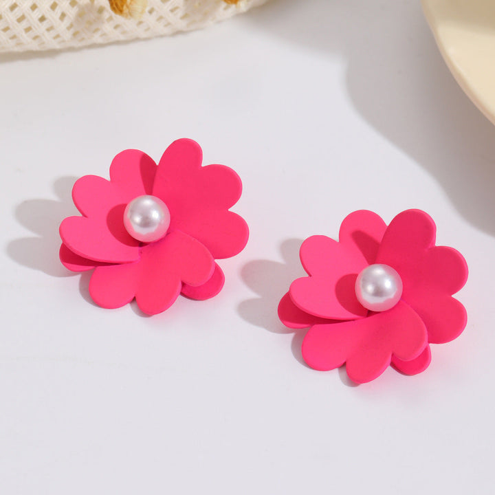 Women's earrings with vibrant floral design and stylish pearl accents Nin Boutique