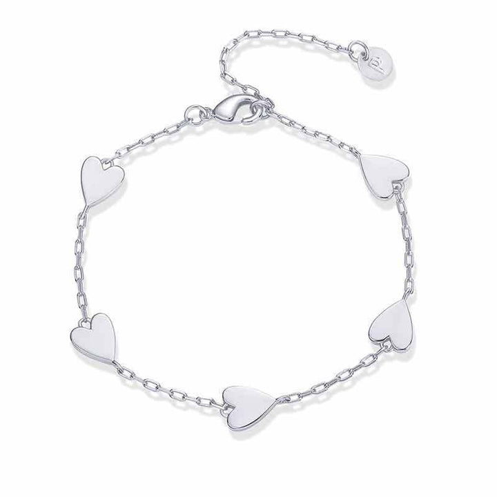 Ladies ankle bracelet with delicate heart pendants and dainty chain design Nin Boutique