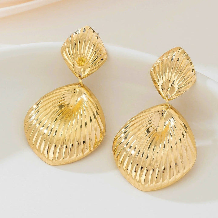 Ladies earrings in artistic sunbeam design Nin Boutique