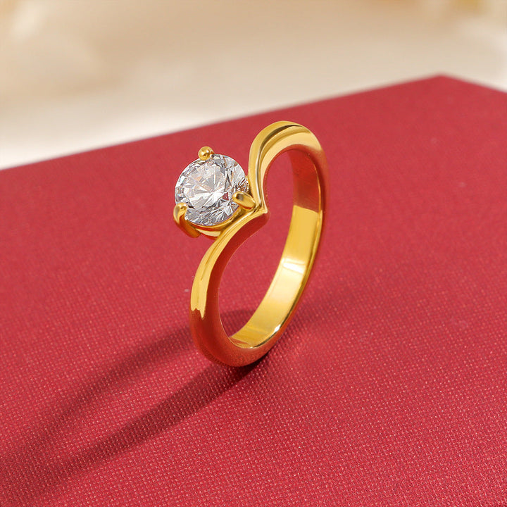 Ladies ring with elegant wave pattern and sparkling zirconia Nin Boutique