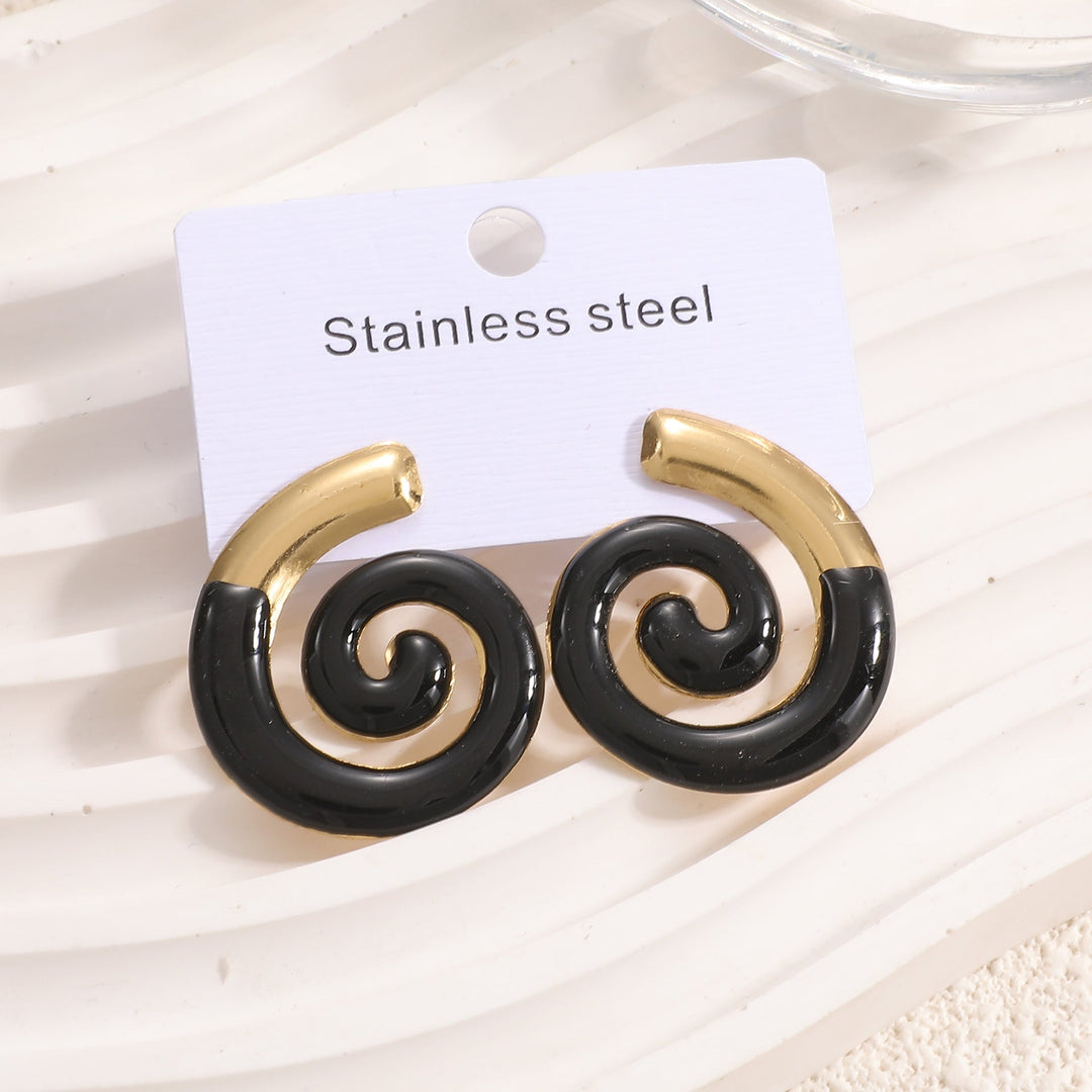 Ladies earrings in artistic sun motif Nin Boutique