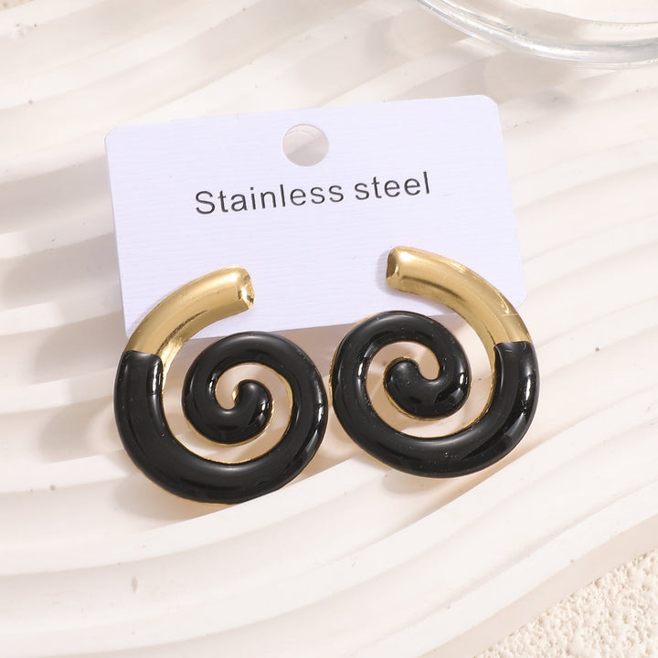 Ladies earrings in artistic sun motif Nin Boutique