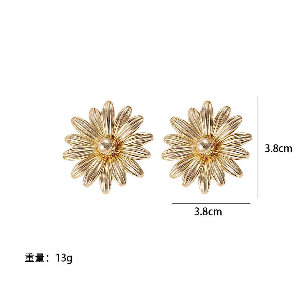 Ladies earrings in intricate flower design Nin Boutique