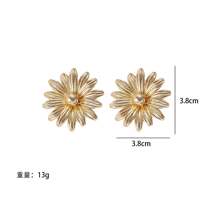 Ladies earrings in intricate flower design Nin Boutique