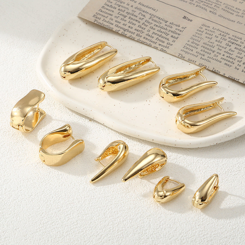 Women's earrings with elegant, curved design Nin Boutique
