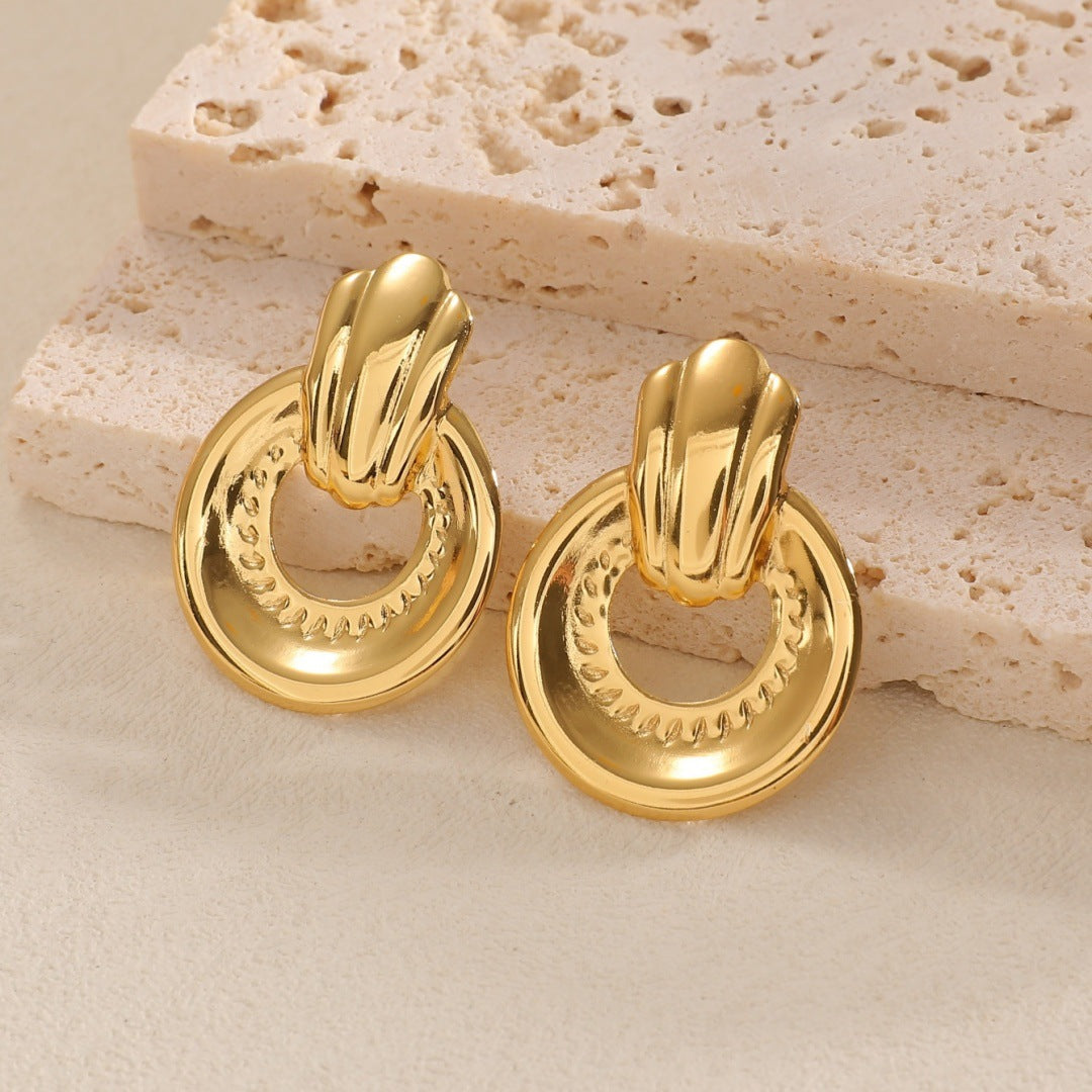 Ladies earrings with modern spiral pattern Nin Boutique