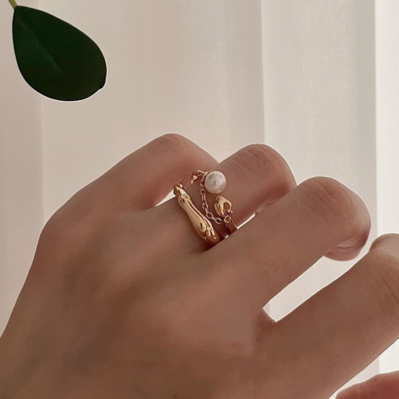 Women Open Ring with Artistic Wave Design and Elegant Pearl Pendant Nin Boutique
