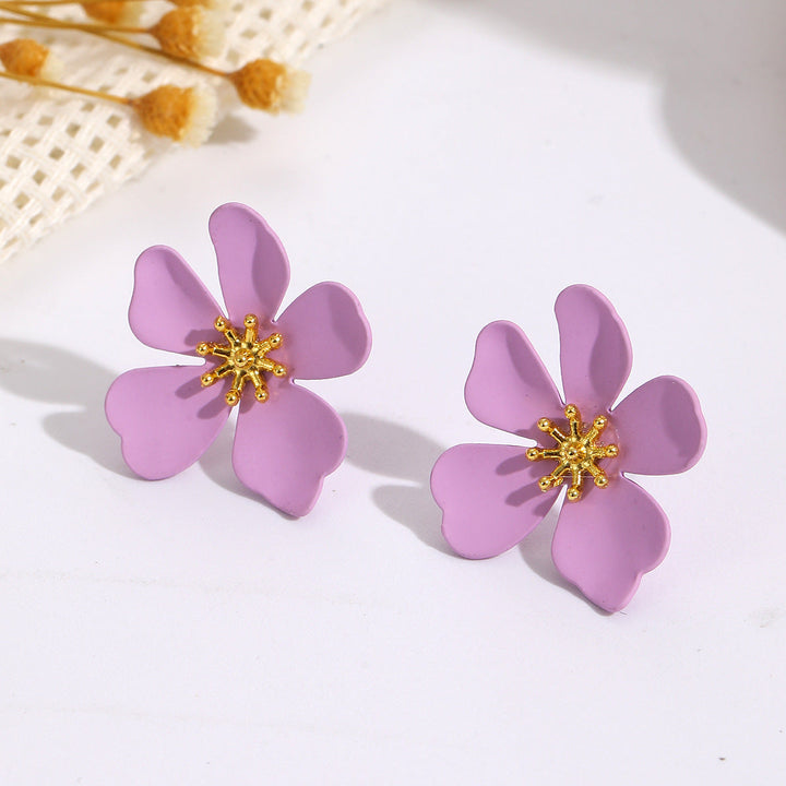 Women's earrings in floral design with shiny golden accent Nin Boutique